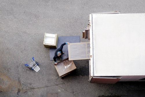 Happy customers with their removal truck